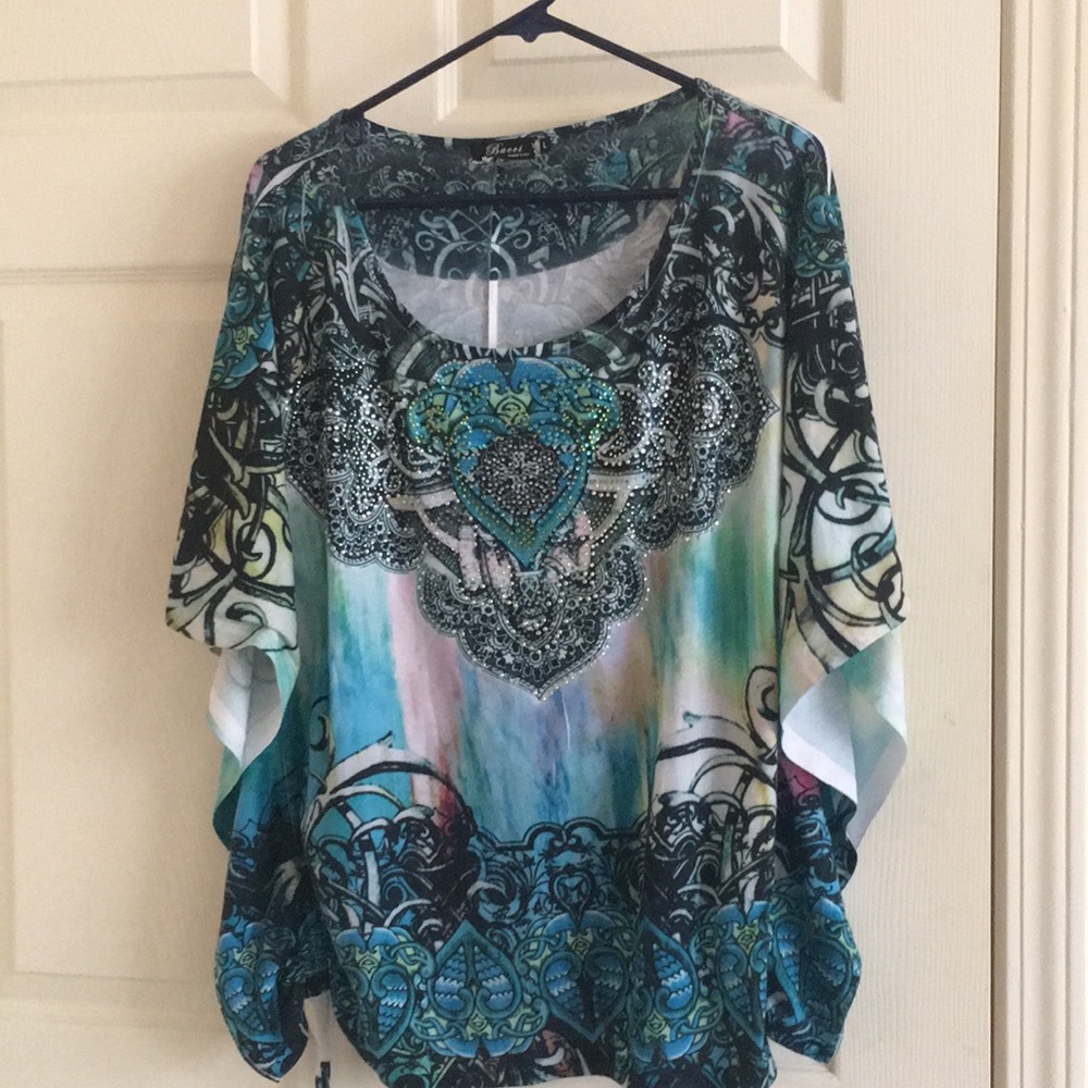 Beautiful peacock colored bling blouse